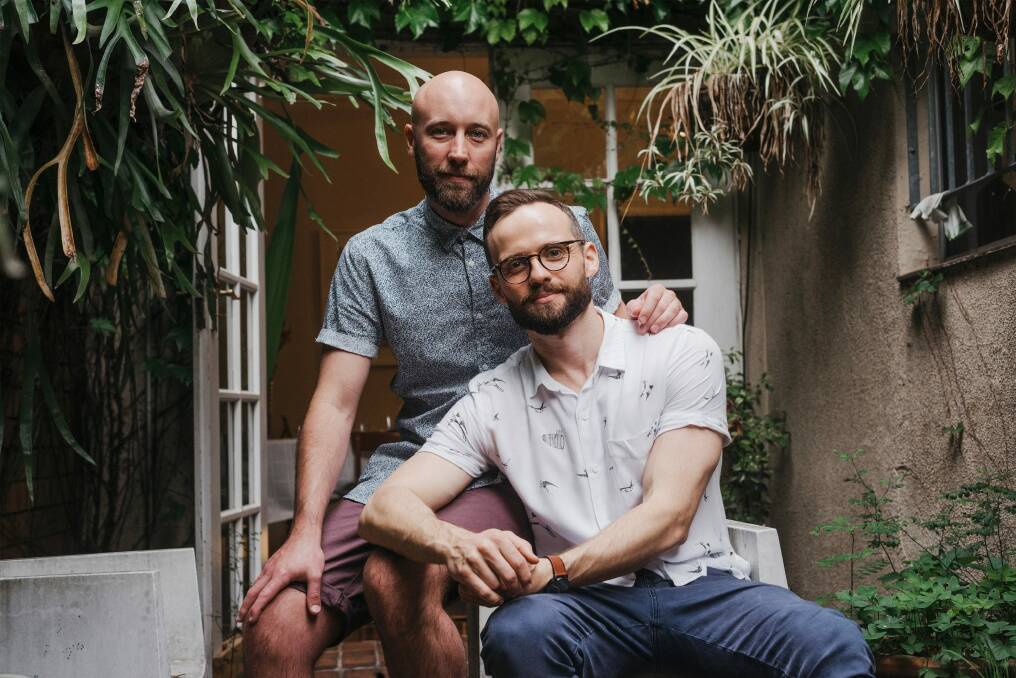 Playwright Tommy Murphy and partner Dane Crawford at their home in Sydney's Surry Hills. Photo: James Brickwood
