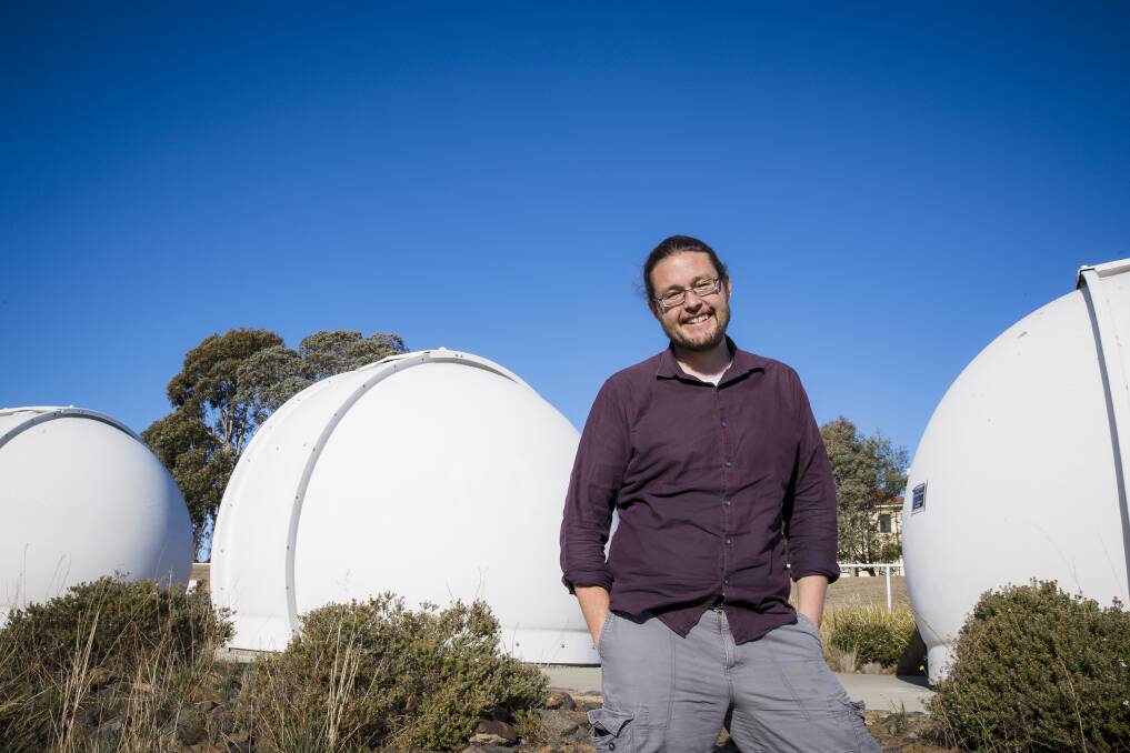 ANU astronomy professor Dr Brad Tucker said more than 3100 people had already pre-registered for the ANU location of Wednesday night's  Guinness World Record attempt for the most people stargazing across multiple venues. Photo: Sitthixay Ditthavong