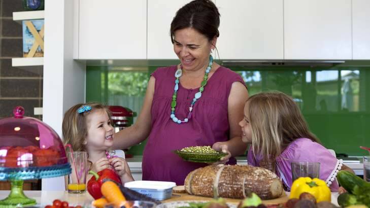 Tina Mizgalski believes providing healthy food for her two young girls (Ella, age 6 and Ruby, age 2) is most important for navigating nutritional choices in their later life. Photo: Katherine Griffiths