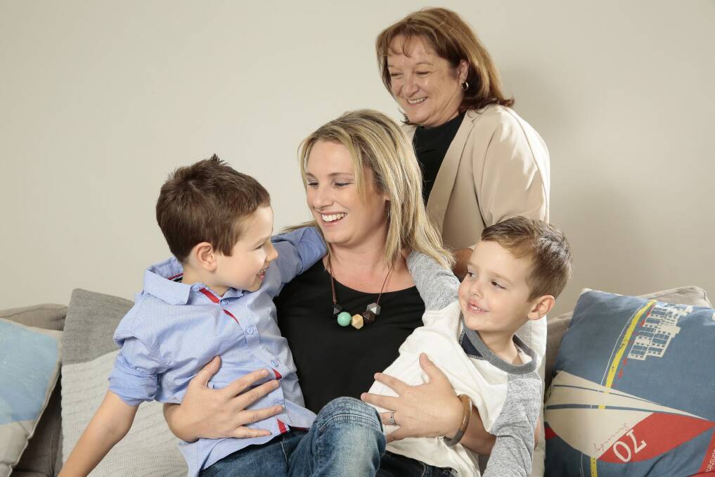 Dannielle Kelly, centre, has been named the Barnardos Mother of the Year for the ACT. She is pictured with sons Aidan, 4, and Liam, 7, and her mum Mary Ford, who nominated her for the award.  Photo: Jeffrey Chan