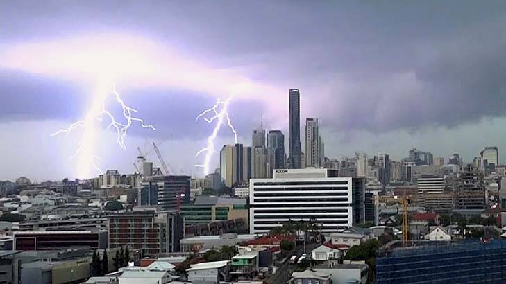 Spectacular scenes ... Brisbane's CBD Skyline being struck. Photo: Steve Ketley
