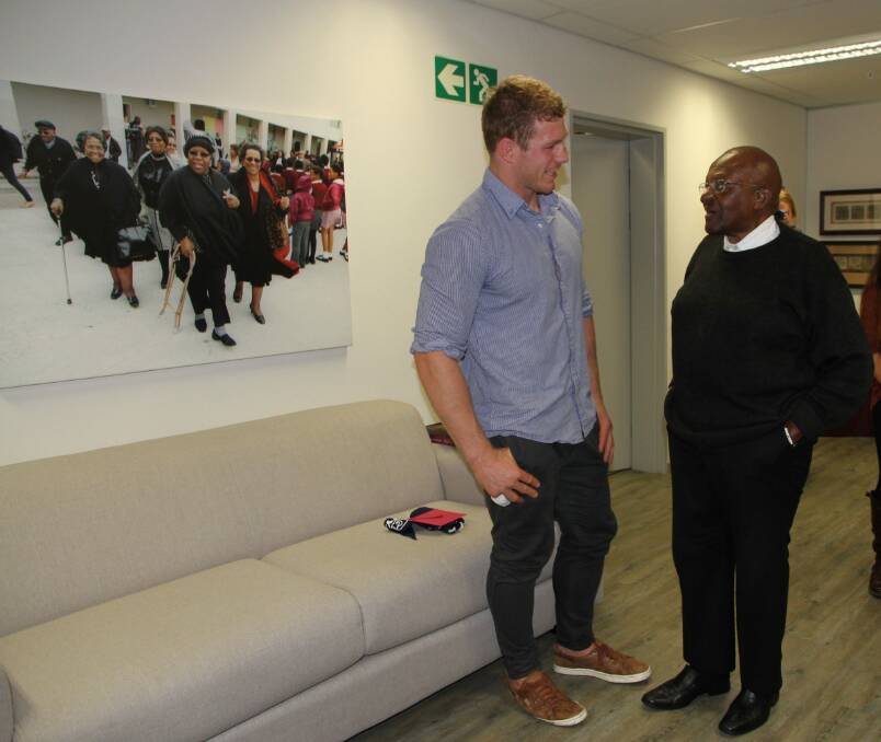 ACT Brumbies and Wallabies flanker David Pocock meets South African Archbishop Desmond Tutu. Photo: supplied