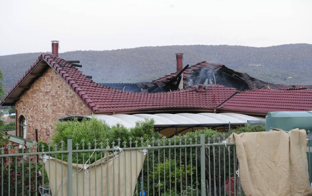 A house fire on Delmar Crescent in Queanbeyan destroyed the top floor of the two-storey home and has caused at least $500,000 worth of damage. Photo: Melissa Adams 