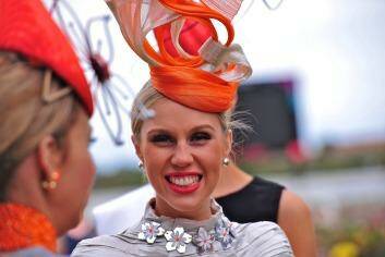 Today's fashions for Melbourne's Spring Racing Carnival are flamboyant and colourful but things were a little different 100 years ago.