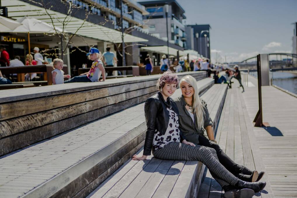 Friends and singers Amber Nichols and Hayley Jensen at the Kingston Foreshore. Photo: Jamila Toderas