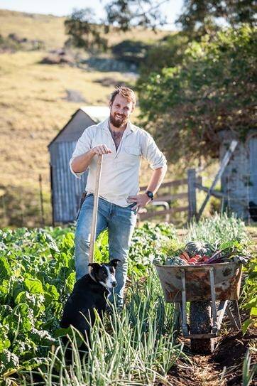 Paul West, author of <i>The River Cottage Australia Cookbook</i>, in his garden.