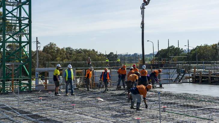 Workers at the Sorell Apartments construction site in Lyons. Photo: Rohan Thomson