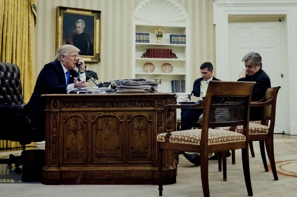 Donald Trump with then-national security adviser Michael Flynn and chief strategist Steve Bannon during a phone call with Australian Prime Minister Malcolm Turnbull in January. Photo: Bloomberg
