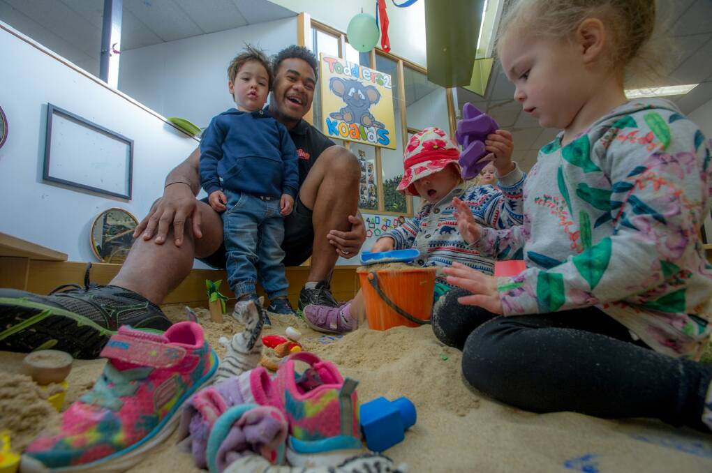 Gungahlin Eagles rugby player Pat Tuidraki at his day job as a childcare worker. Photo: Karleen Minney