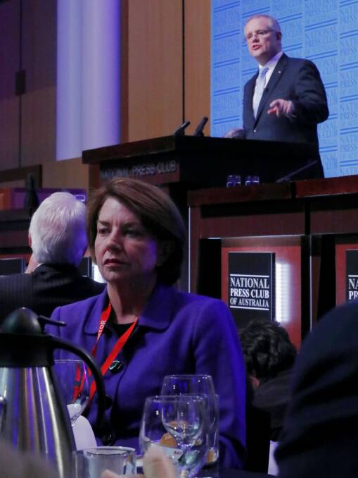 Anna Bligh listens as Treasurer Scott Morrison delivers his post-Budget address in the Great Hall at Parliament House. Photo: Alex Ellinghausen