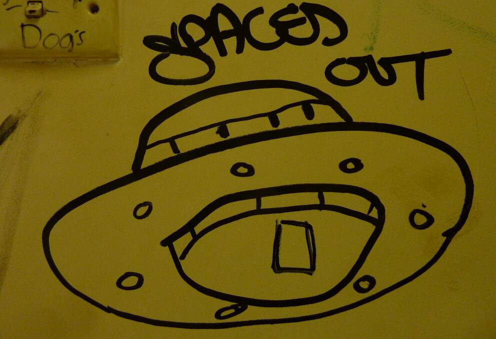 Graffiti at the long-lost public shower amenities at Woden bus interchange. Photo: Tim the Yowie Man