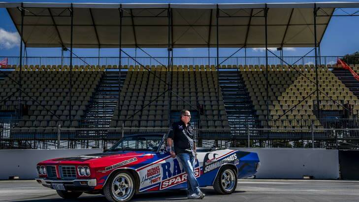 Summernats General Manager Russell Avis, with the Summernats' Holden HQ Statesman Convertible, pictured on the new burnout track at EPIC on Sunday. Photo: Rohan Thomson