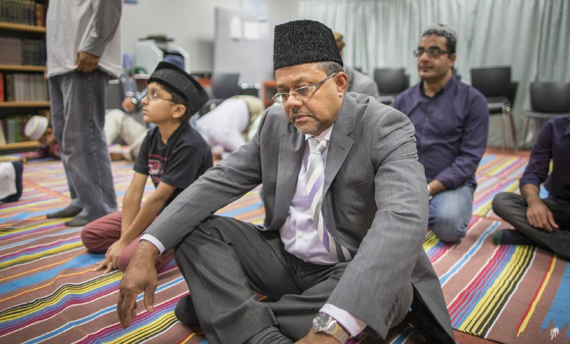 Ahmadiyya Muslim Association president Mahammad Hasan at a weekly prayer session in the Griffin Centre, Civic. Photo: Matt Bedford