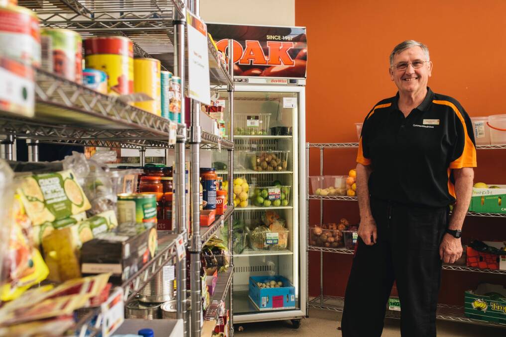 Communities at work volunteer Graeme Matthew at the Pantry he helps run for disadvantaged Canberrans. Photo: Rohan Thomson