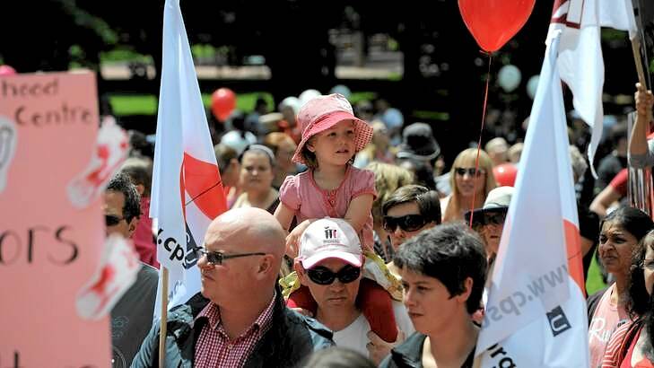 3-year-old Josephine Foley of Watson gets a birds eye view of the rally on her father's (Tom) shoulders. Photo: Graham Tidy