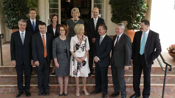 Prime Minister Julia Gillard and Governor-General Quentin Bryce pose for photos with  new ministers after the swearing-in ceremony. Photo: Alex Ellinghausen