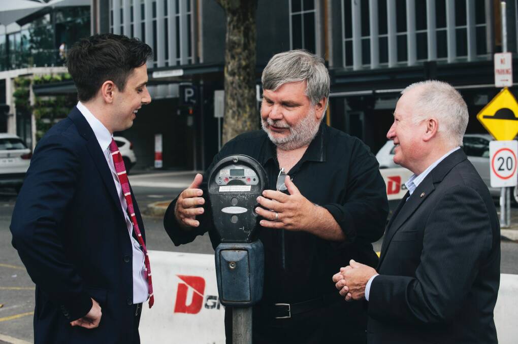 Labor's Michael Pettersson, parking operations manager Richard Siddall, , and acting urban services minister Mick Gentleman. Photo: Rohan Thomson