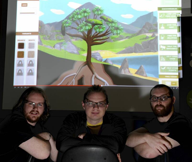 Canberra video game developers, from left, Micheal  Muirden, Stephen Ashby and Duncan Henderson have won grants to help them promote their new games. Photo: Graham Tidy