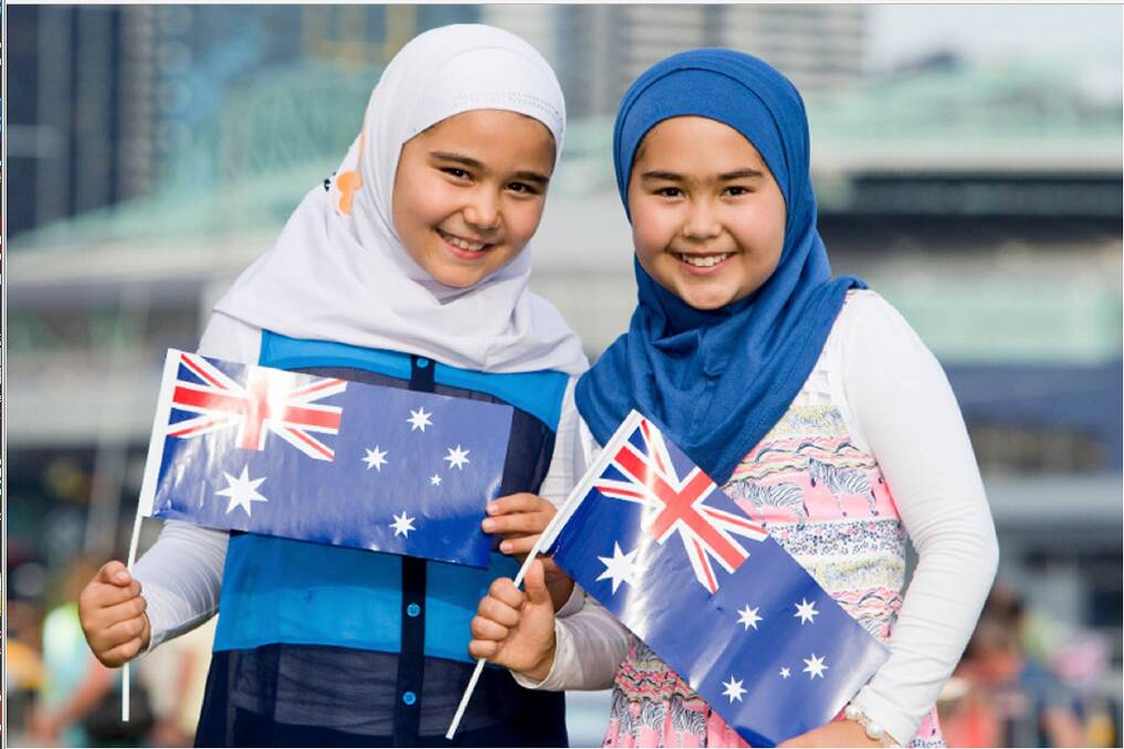 The billboard featuring two Muslim Australian girls was removed  in Melbourne following complaints from some constituents. Photo: Victorian Government