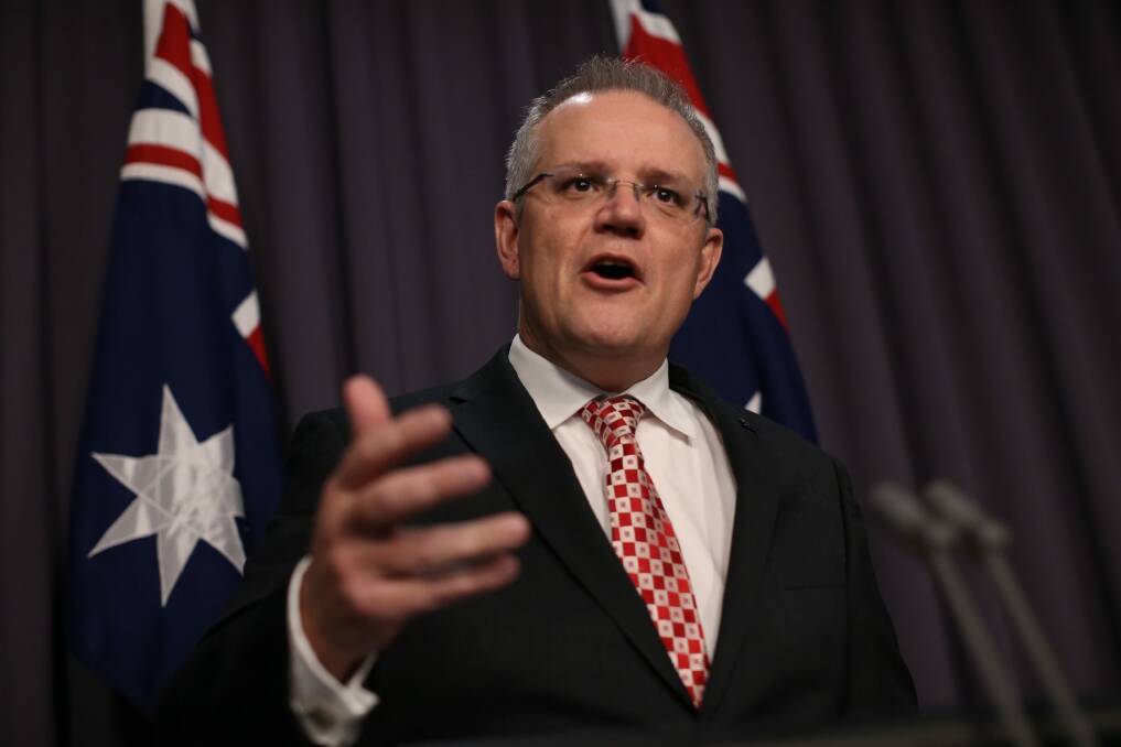 Treasurer Scott Morrison will discuss tax reform options with state treasurers next week. Photo: Andrew Meares