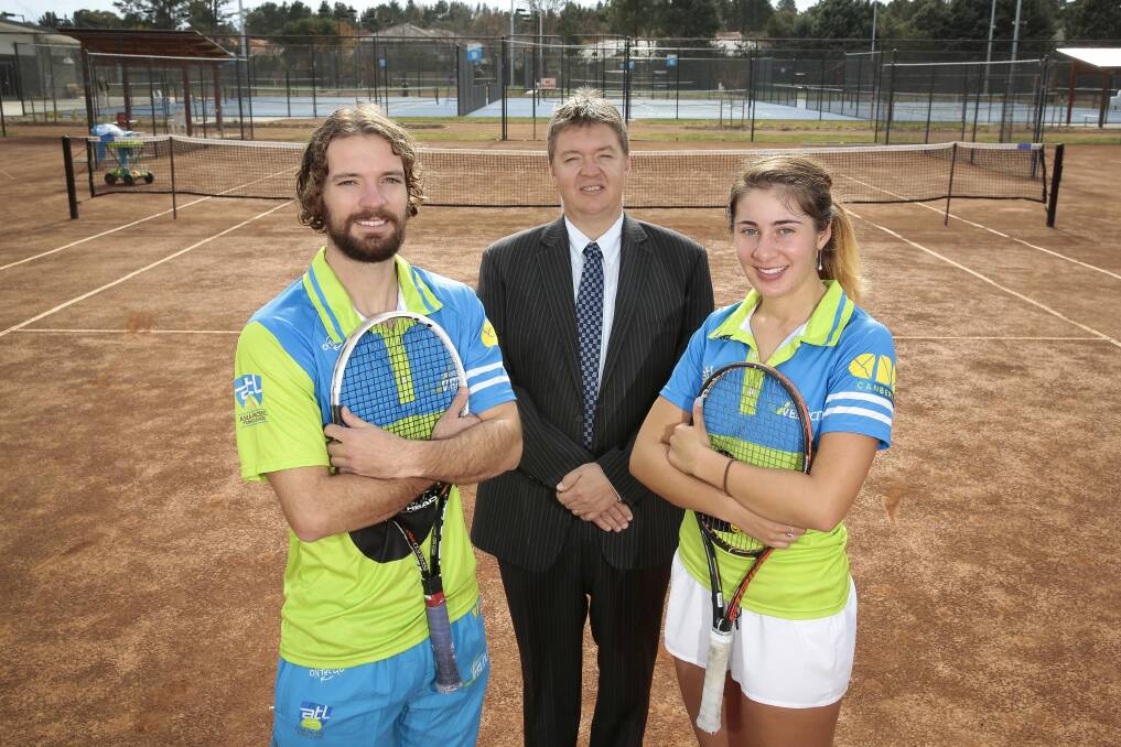 Jake Eames, Tennis ACT CEO Ross Triffitt and Imogen Clews at the Canberra Tennis Centre in Lyneham. Photo: Jeffrey Chan