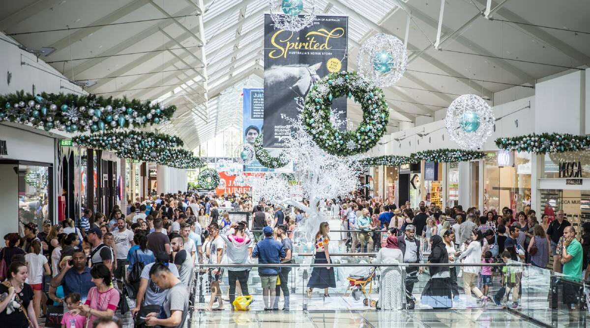 Shoppers flock to the Canberra Centre for Boxing Day sales. Photo: Matt Bedford