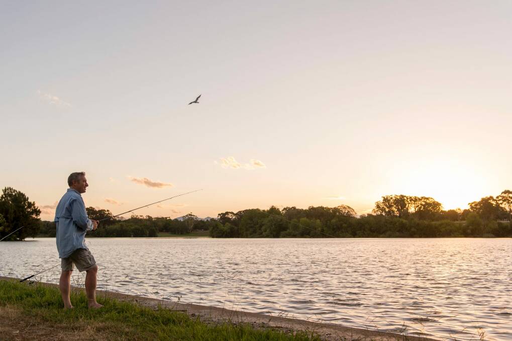 Canberra Fishermans Club president Glen Malam wants more fishing bins to help keep (and in some spots, make) the shores of Lake Burley Griffin clean. Photo: Jay Cronan