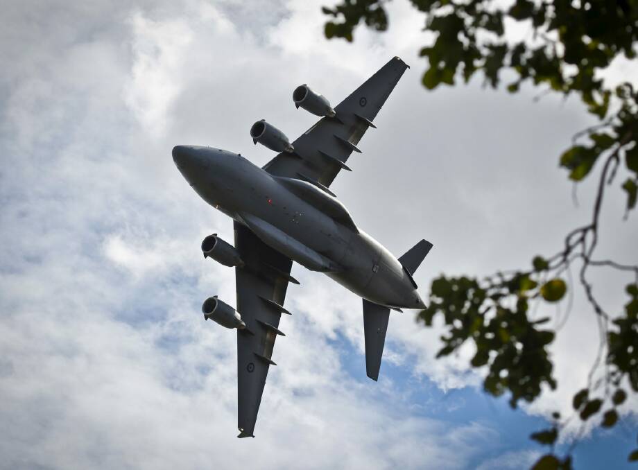 A C-17A Globemaster travelling low and slow.