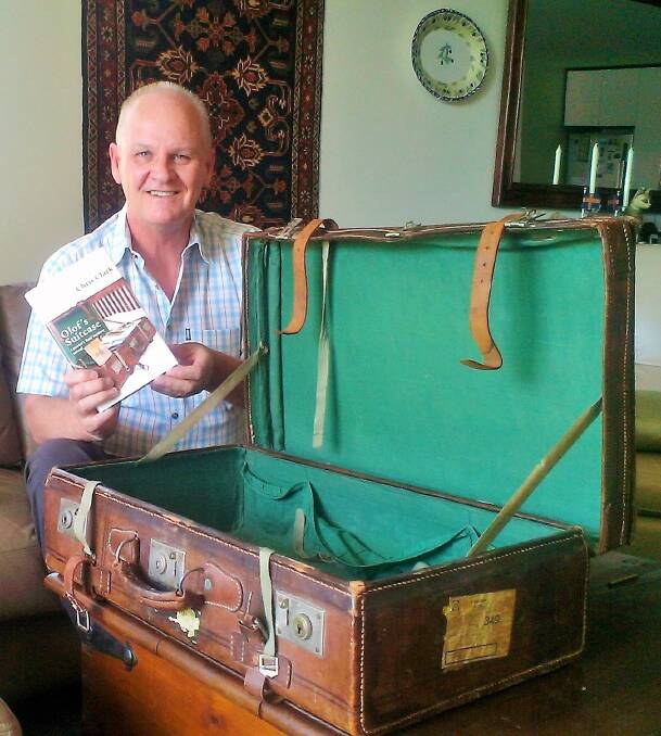 Chris Clarke with the suitcase of his Swedish grandfather Olof Johanson. Photo: Chris Clark