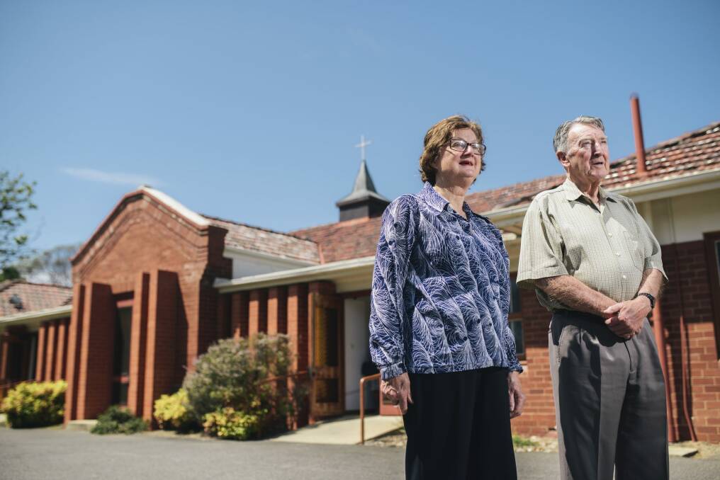 St Patrick's Church, Braddon, historian Elizabeth Baxter and parishioner Vin Kane are looking forward to celebrations for the 80th anniversary of the church in October. Photo: Rohan Thomson