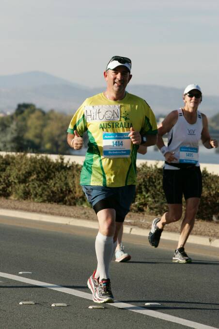 Hilton Kahlberg running the Canberra marathon in 2016. He will take on the same event this year in April.  Photo: Marathon Photos