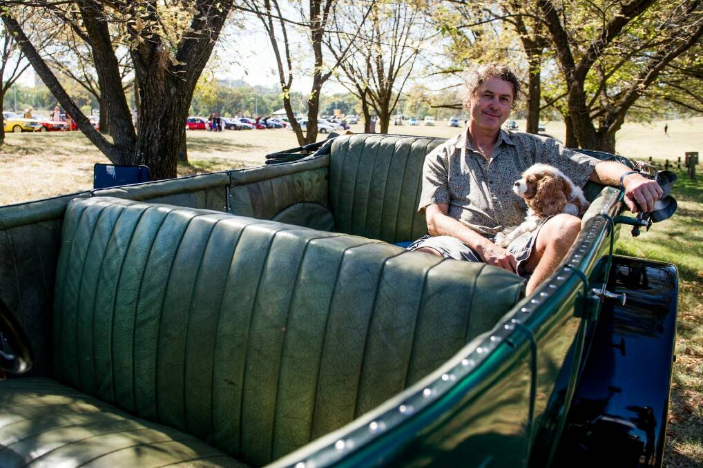 Ross Merdal with his dog, Charlie, in a 1924 Sunbeam at the Wheels event in Kings Park.
 Photo: Jay Cronan