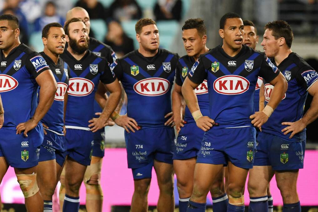 Dejection: The bulldogs endured another tough night. Photo: AAP