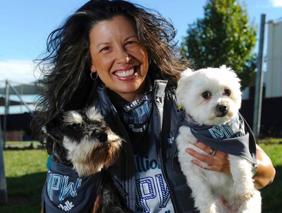 RSPCA CEO Tammy Van Dange, with two starters for the Million Paws Walk, which is on Sunday. Photo: Graham Tidy