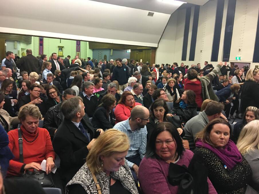 About half of the crowd at a packed public meeting held at St Clare's College in Griffith. Photo: Emily Baker