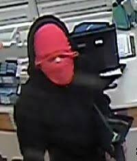 One of the men who robbed Coles in Curtin on Sunday night. Photo: ACT Policing