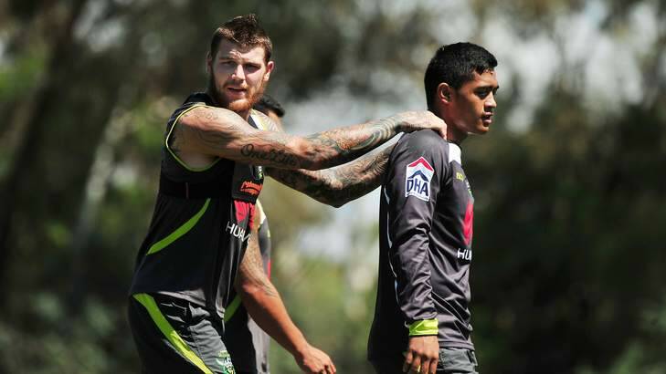 Former Raiders fullback Josh Dugan with Anthony Milford. Photo: Colleen Petch