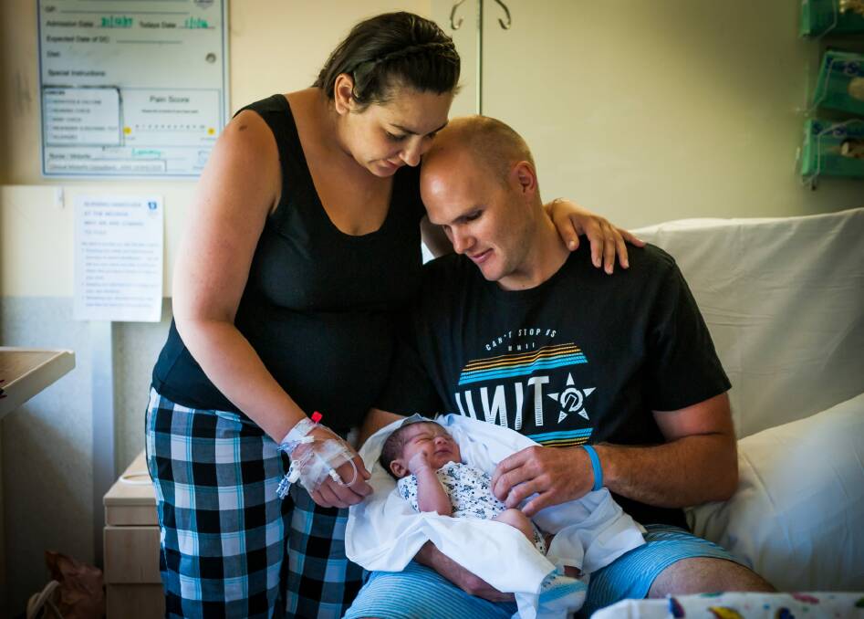 Michelle Fabbo and Beau Apps with their baby Cameron Beau Apps, the first baby born in Canberra in 2016 at Calvary Hospital. Photo: Elesa Kurtz