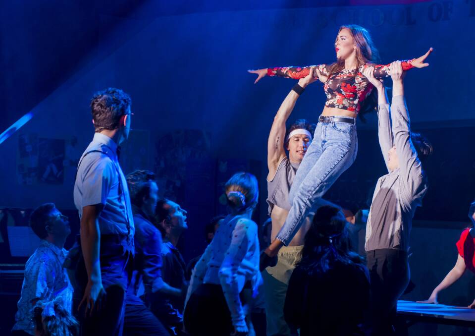 <p>Pippin Carroll, left as Schlomo and Maddy Betts (aloft) as Carmen in <i>Fame the Musical</i>.</p> Photo: Janelle McMenamin