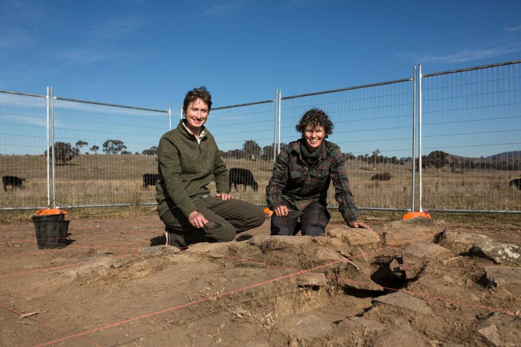 Archaeological dig of 19th century school house in Googong. ANU archaeologist Dr Duncan Wright and principal archaeologist Dr Rebecca Parkes. Photo: Jamila Toderas
