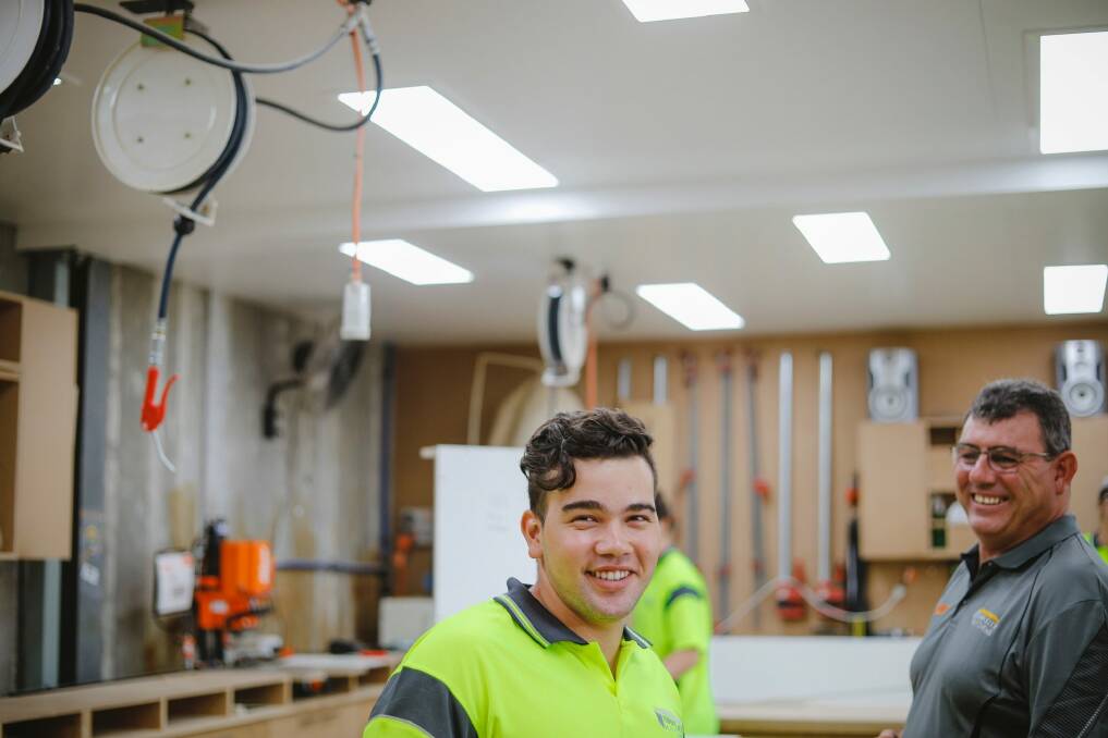 Second-year apprentice in cabinet making Jawad Haideri and David Jackson, owner of Simplicity Kitchens. Photo: Sitthixay Ditthavong