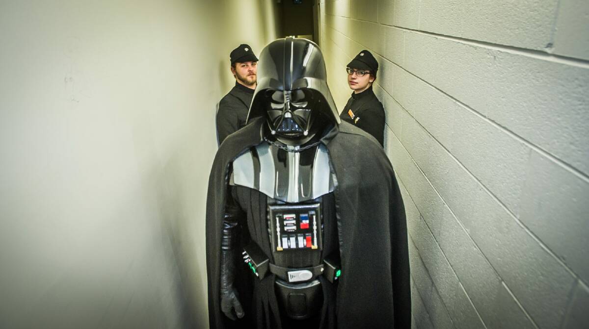 Darth Vader Jason Feldner (centre) and imperial officers Matt Mulcahy and Tegan Smith are members of Canberra's Black Tower Squad. Photo: Karleen Minney