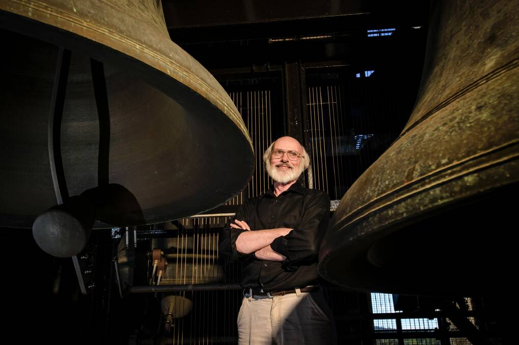 Visiting carillonist Karel Keldermans with the bells of Canberra's carillon.  Photo: Sitthixay Ditthavong