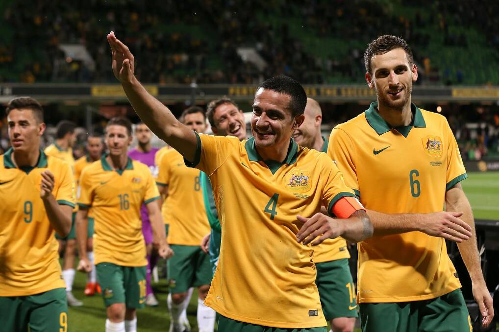 Socceroos great Tim Cahill saluates the crowd in Perth after Thursday night's 5-0 win against Bangladesh. Photo: Getty Images