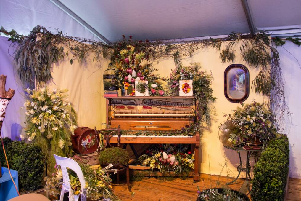 A salvaged piano stars in the display by CIT students at the Floral Emporium Tent at Floriade.