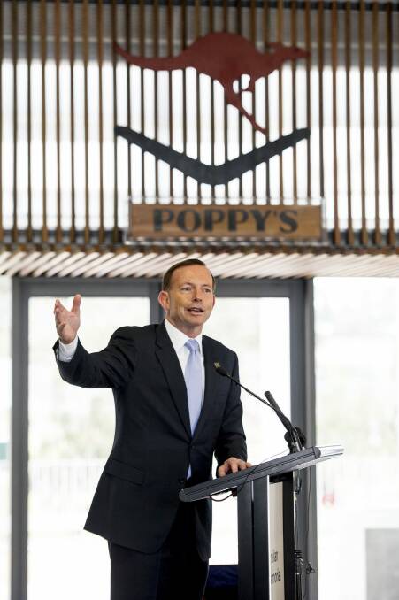 Prime Minister Tony Abbott speaks the opening of the cafe. Photo: Jay Cronan