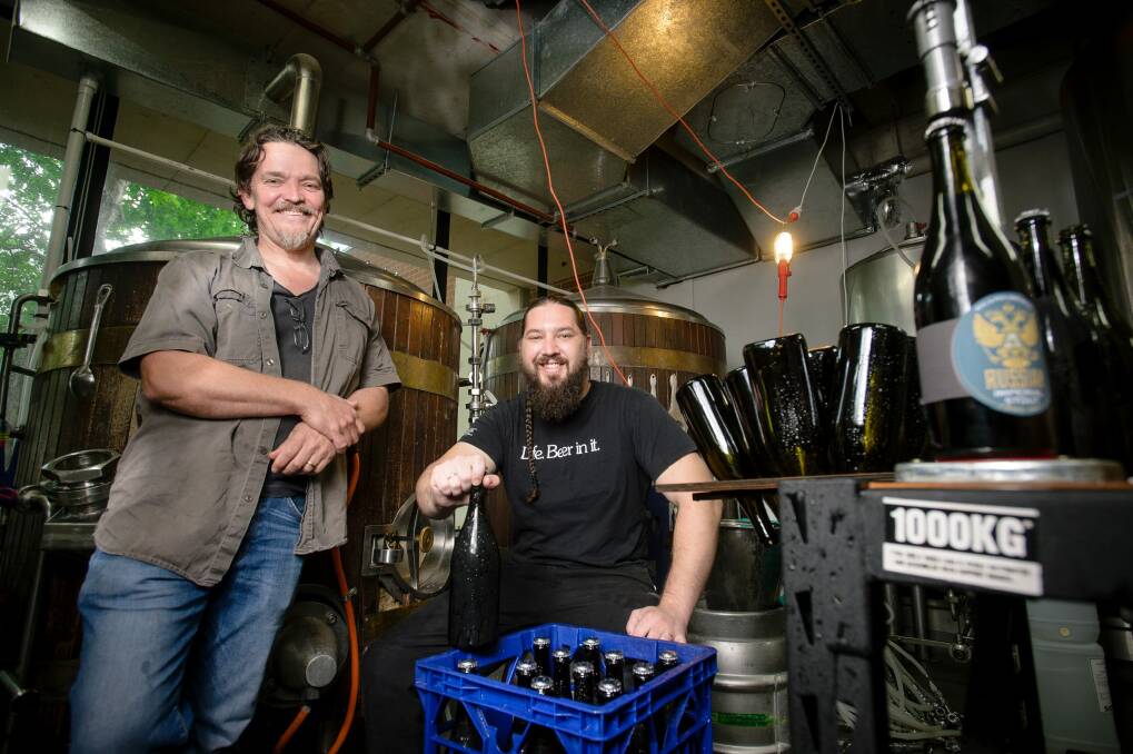 Wig and Pen brewers James Paisley and Justin Wilkes when the brewery started bottling its beer in 2017. Photo: Sitthixay Ditthavong