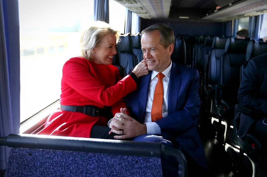 Makeover: Opposition Leader Bill Shorten and wife Chloe in the campaign bus in July last year. Photo: Alex Ellinghausen 