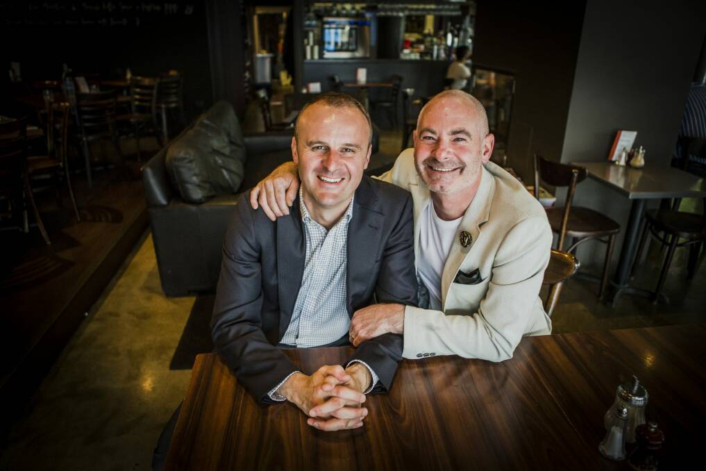 Chief Minister Andrew Barr, pictured with partner Anthony Toms in 2014, says there is "no place in any civilised society for this kind of hate". Photo: Jamila Toderas