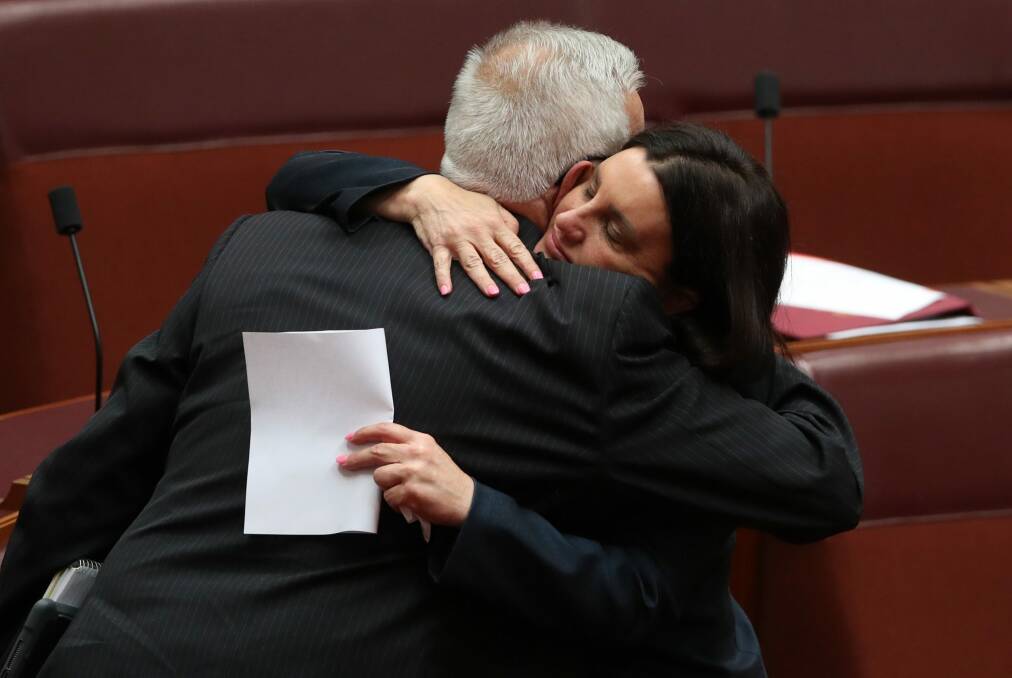 Jacqui Lambie was embraced by Senator Doug Cameron. Photo: Andrew Meares